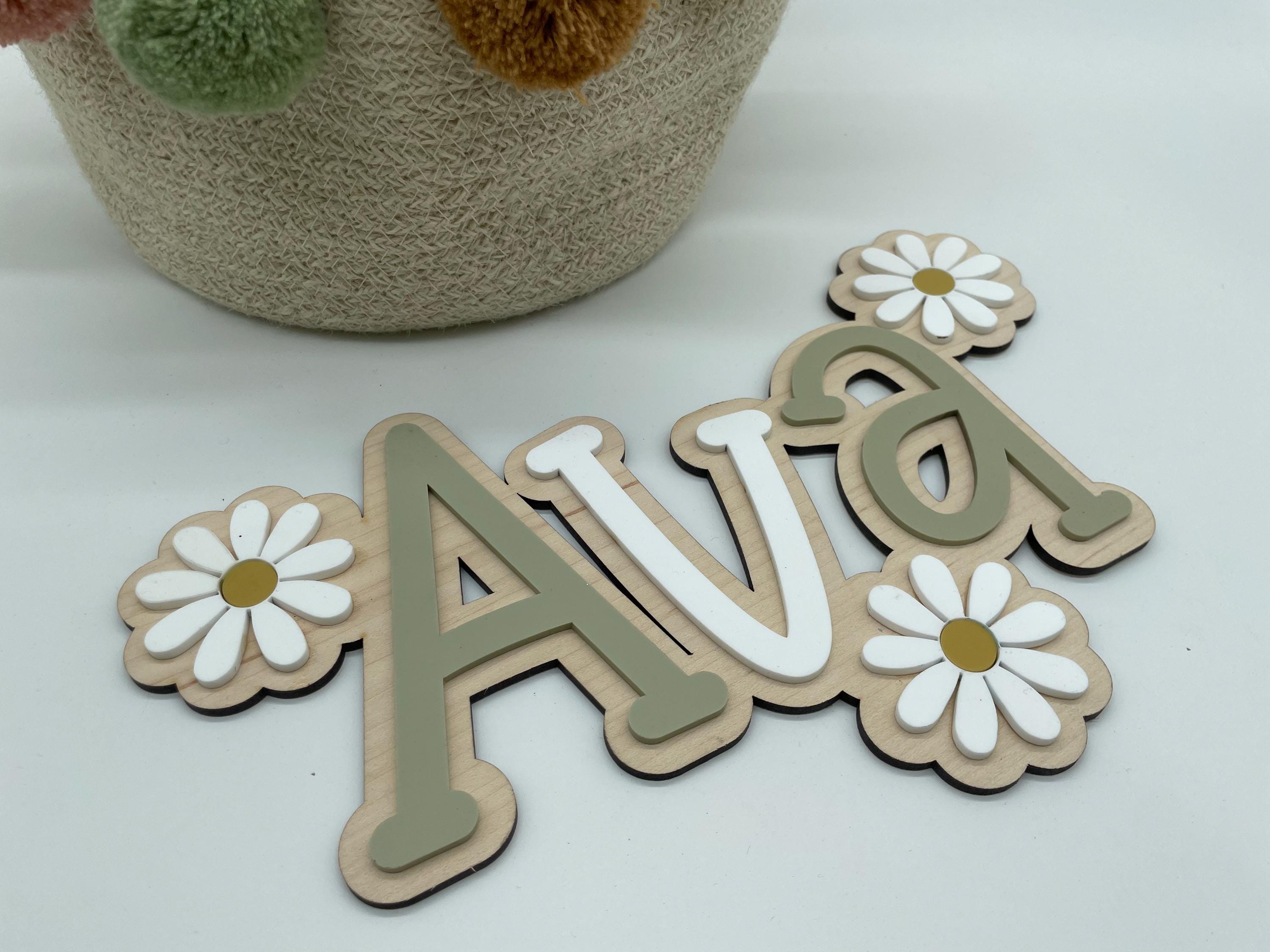 Wood name sign with flowers
