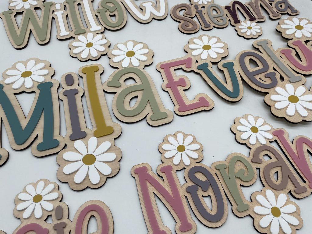 Wood name sign with flowers