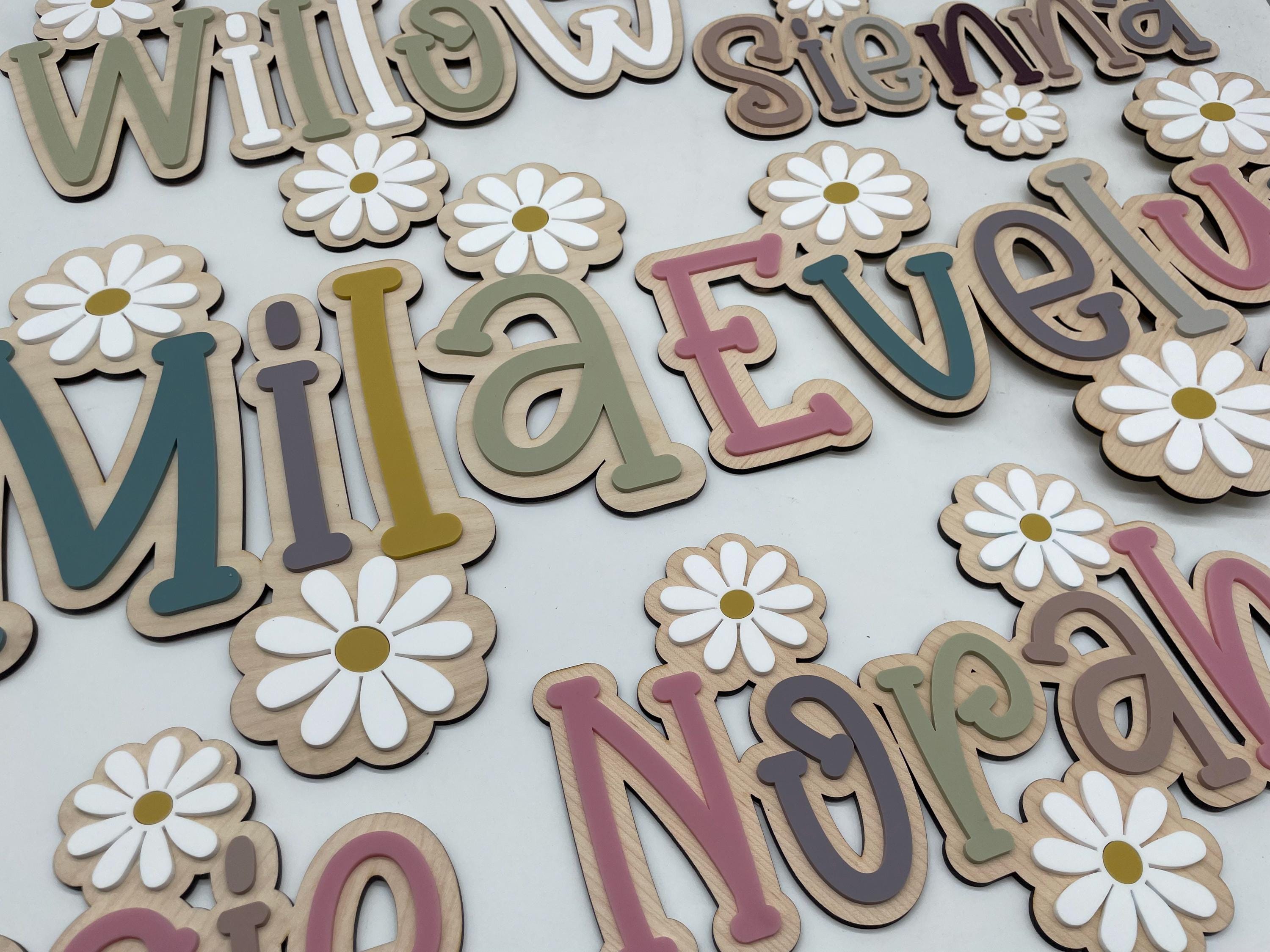 Wood name sign with flowers